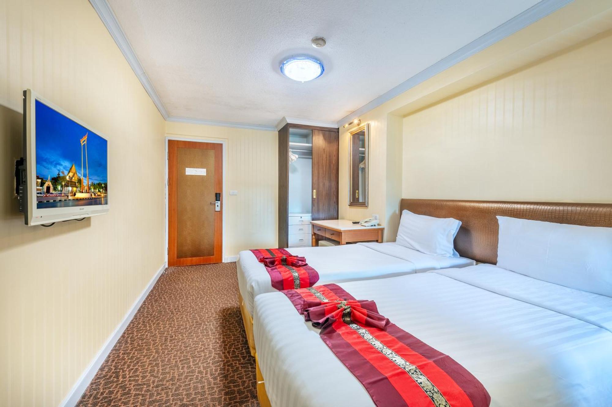 Chambre Deluxe Double ou Lits Jumeaux
